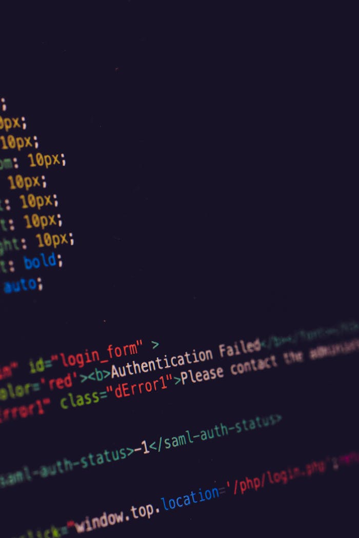 Home Close-up of programming code on a dark screen, highlighting software development concepts.